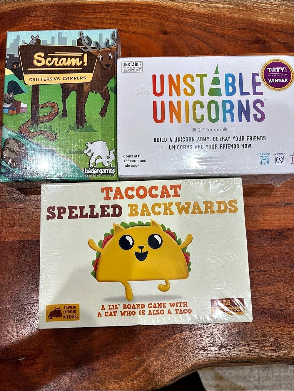 Exploding Kittens Scram! Unstable Unicorns; Taco Cat Spelled Backwards Sealed